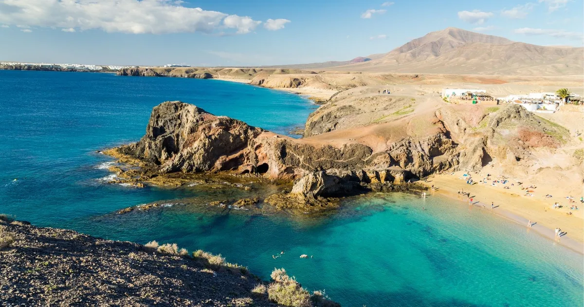 Turquoise cove and volcanic coastline near Papagayo, Lanzarote